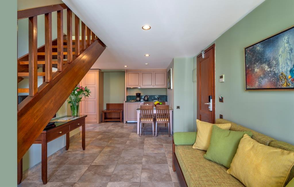Porto Platanias Maisonette with Garden or Pool View interior image of the kitchen and living room