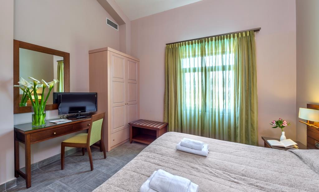 Porto Platanias Maisonette with Garden or Pool View interior image of the master bedroom