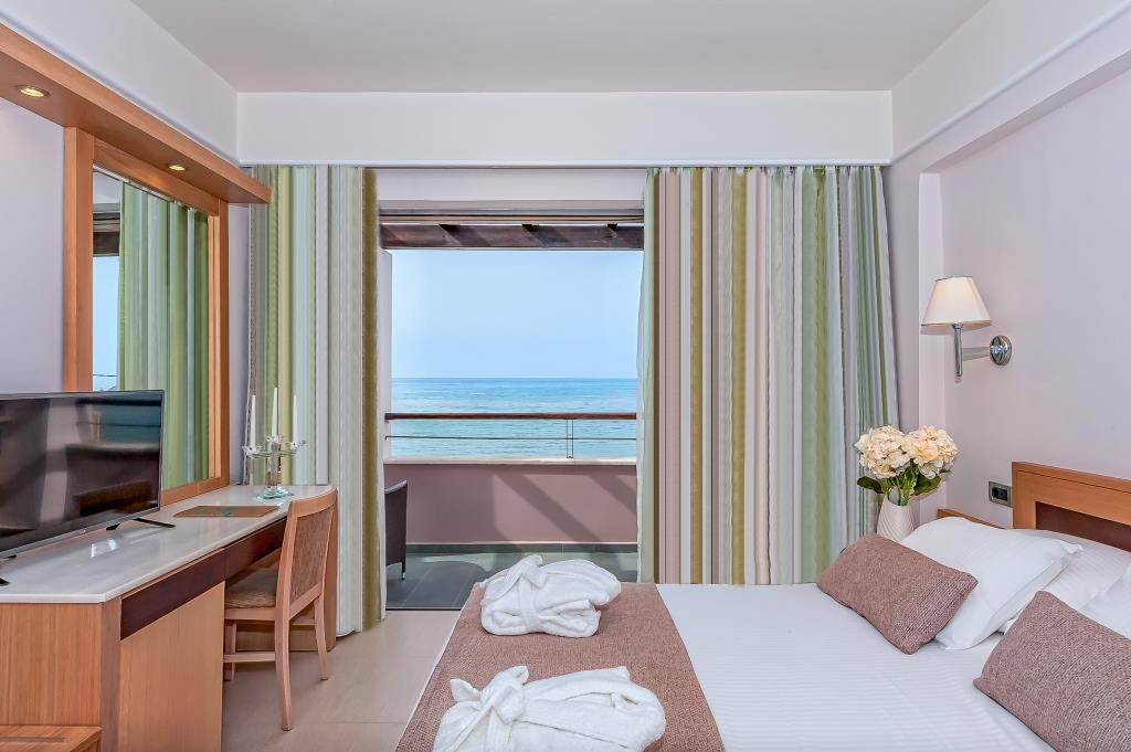 Porto Platanias Double Bedroom with side sea view interior image